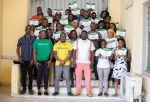 • Dr Emmanuel Attah Kumah Amponsah (third from right) with participants after the training