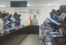 • Mr Iddrisu (middle) swearing in members of the board