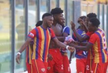 Hearts players join lone goal scorer Yiadom (shirtless) to celebrate the historic win Photo Raymond Ackumey