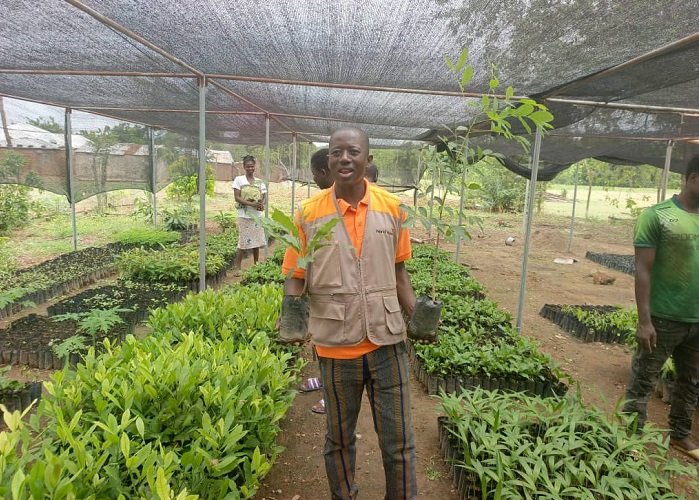 • Joseph Abugri Talata being conducted through the seedlings farm of Edward Yara at Kadognia