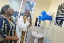 • Inset: Most Rev. Alfred Agyenta (right) unveiling the plaque of the maternity centre
