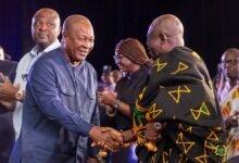 President Mahama exchanging pleasantries with Asantehene Otumfuo Osei Tutu II during the summit