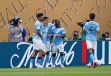 Manchester City players celebrating the second goal