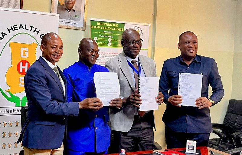 • Professor Akoriyea (second from left) with partners displaying the MoU Photo: Stephanie Birikorang