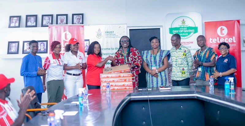 • Ing. Patricia Obo-Na (fouth from left) presenting the laptops to Prof. Mrs Dickson