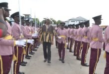 • Alhaji Muntaka (in smock) inspecting the guard of honour during the graduation Photo: Victor A. Buxton