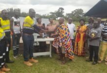 • Mr Danso handing over the items to Nana Owusu Anti, Acting President, Gyedu Traditional Council