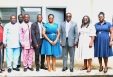 • Mrs Esther Kumi (fifth from right) with Mr Martin Adu-Owusu (fourth from right), Staff of NIB and NTC management after the meeting Photo: Okai Elizabeth