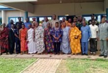Mr John Kwadwo Gyapong (in smock) with the chiefs