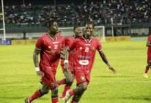 • Opoku joined by Sampson Eduku and Henry Ansu to celebrate. Photo: Raymond Ackumey