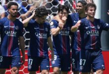 • Players of PSG join Kang-In Lee (3rd left) to celebrate his goal