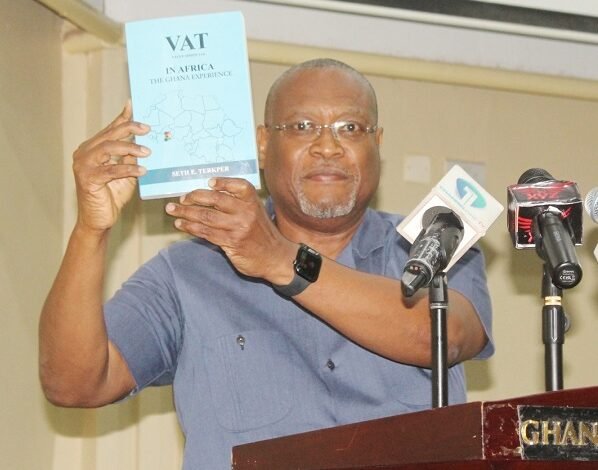 • Dr Alex Segbefia (inset) launching the book Photo: Ebo Gorman