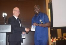 • Prof. Alex Dodoo (right) and Dr Norbert Schultes launching the Construction Guide Book Photo: Stephanie Birikorang