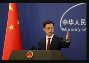 • Russian President Vladimir Putin shakes hands with Chinese President Xi Jinping