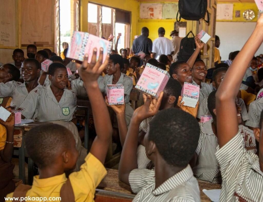 Some female students holding thier sanitary pads