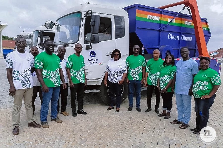 • Some officials of Zoomlion by one of the trucks