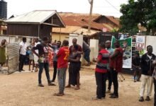• Some residents standing in front of the old Palace