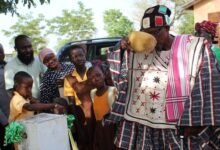 Inset: Naba Baba Salifu Atamale Lemyaarum (in smock) Paramount Chief, Bongo drinking water in a calabash at the inauguration