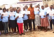 Mr Willibald Kafui Duho (middle) with the graduands showing their certificates after the graduation ceremony Photo: Ebo Gorman