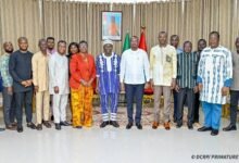 • Dr Joseph Siaw Agyepong and Mr Rimtalba Jean Emmanuel Ouédraogo (middle) with other officials after the meeting