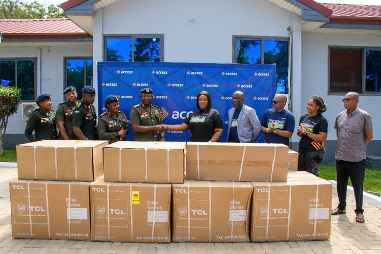Ms Opoku in a handshake with Brigadier General Osmanu during the donation