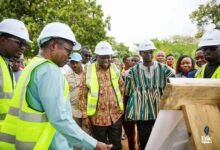 Mr Eric Opoku (third from left) being brief at the site