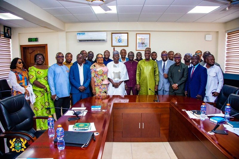 Haruna Iddrisu (in caftan) with members of the board