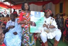 Ms Sowah receiving the plaque from Nii Kwade Okropong I, La Abese Adonten Mantse during the programme Photo: Victor A. Buxton