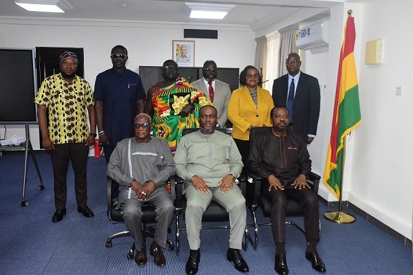 • Mr Kenneth Gilbert Adjei (seated middle) with the new board members Photo: Seth Osabukle