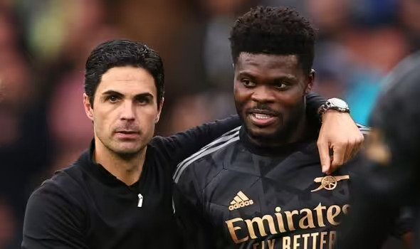 • Arteta (left) with Partey