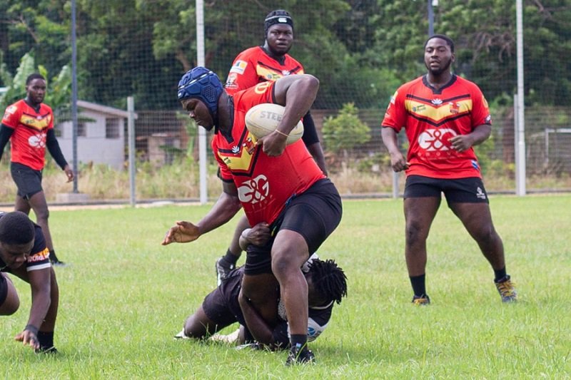 • Bulls’ Ace Reindolf (with ball) avoids a tackle from a Titans defender who attempts to track him
