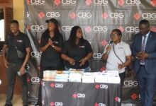 • Mrs Juliana Mensah (second from right), Headteacher, St. Francis Catholic Primary School speaking at the event