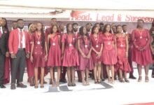 • Ms Magdalene Dzifa Adzanu (at the extreme right and Dr Kadogbe also at extreme left) in pose with the graduands