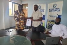 • Coach Sulley in a handshake with Mr Alagidede (left)