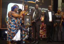 • Dr Zakaria Awushi Abdul-Malik Seidu receiving his award from the Ga Mantse
