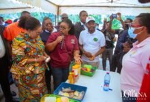 • Mrs Lordina Mahama (left) being briefed at the programme