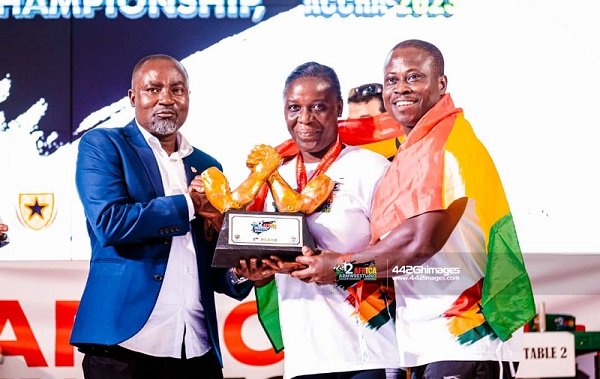 • FLASHBACK: Ghana Armwrestling Federation president Charles Osei Asibey presenting a trophy to athletes