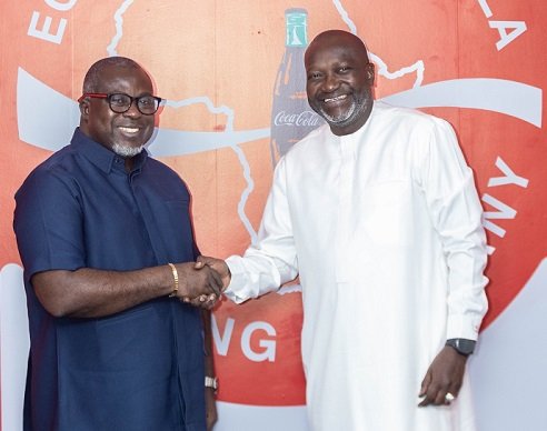 • Mr Sarpong (right) exchanging pleasantries with Mr Felix Gomis