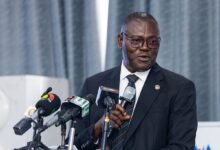 • Prof. Ali-Nakyea (inset) speaking at the event