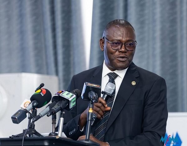 • Prof. Ali-Nakyea (inset) speaking at the event