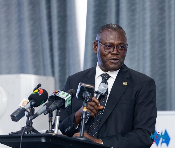 • Prof. Ali-Nakyea (inset) speaking at the event