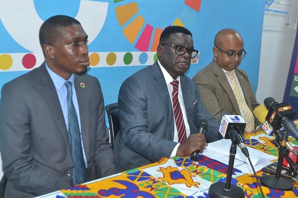 Opoku-Agyemang embracing Mrs Charlotte Osei (infront) after her lecture. Applauding include Mr Alex Segbefia and Ms Nana Oye Bampoe Addo Photo: Ebo