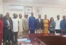 Mr Haruna Iddrisu (seventh from right) with the newly inaugurated NTC Board