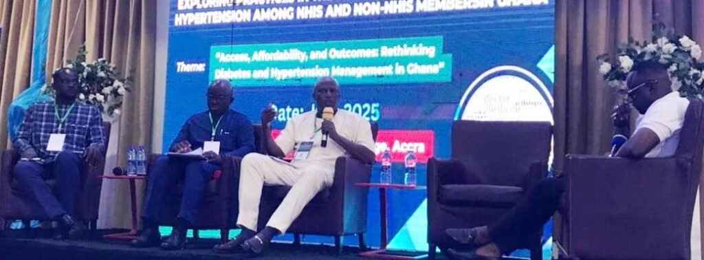 Professor Gordon Abekah-Nkrumah (second from right) speaking at the event