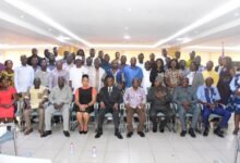 Mr Morgan Ayawine (middle) with the executives of ICU after the meeting Photo: Seth Osabukle