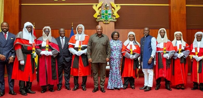 • President Mahama (middle) and Vice President Naana Jane Opoku-Agyemang with the judges after the swearing in