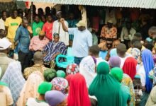Dr Mohammed Amin Adam interacting with the people during his visit