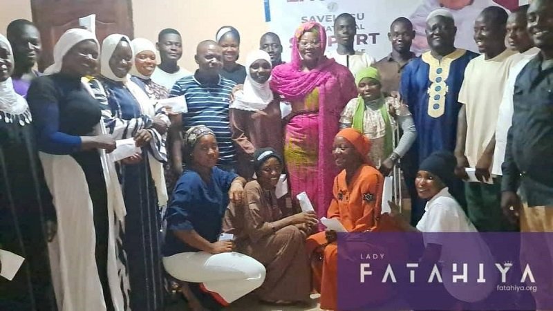 • Hajia Fathahiya Abdul-Aziz (middle) with the beneficiary students