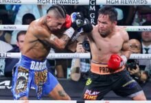 Manny Pacquiao (right) during his title challenge against Mario Barrios