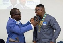• Mr Dogbey (right) being decorated with the chain of authority